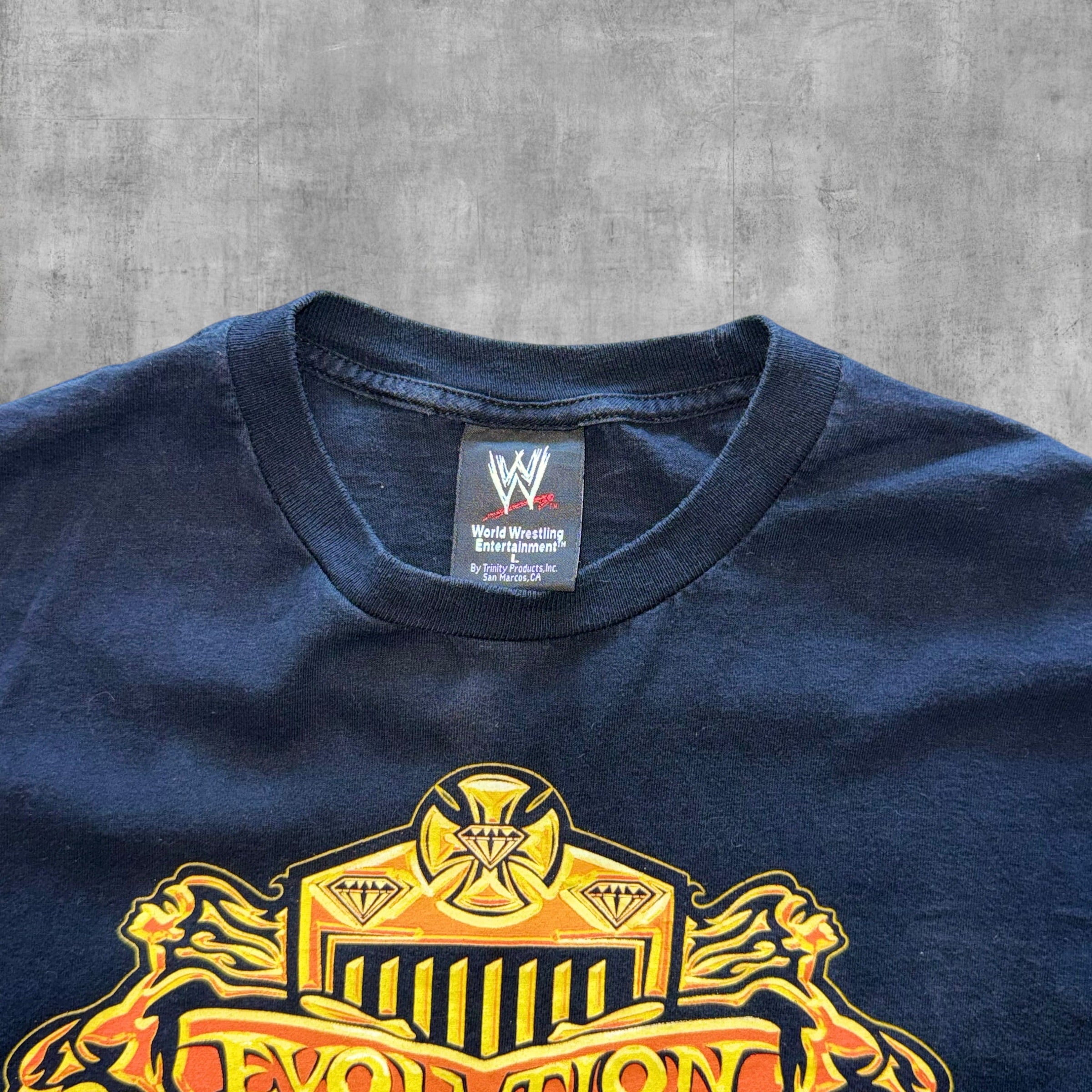 VINTAGE EVOLUTION PAID LAID AND MADE WWE - 2003 - L